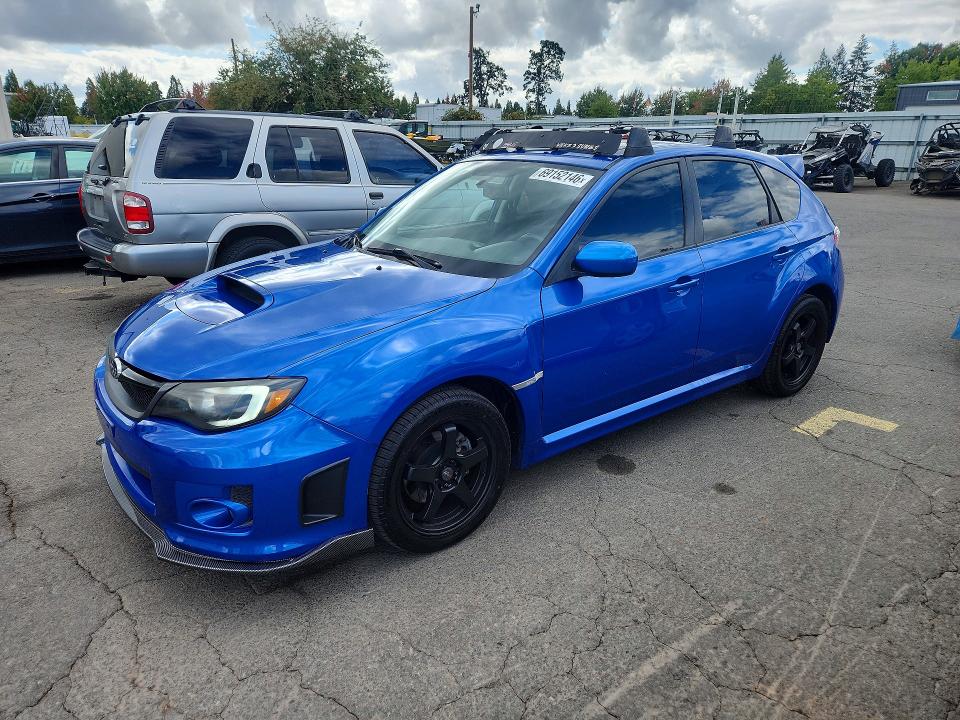 2012 Subaru Impreza VIN JF1GR7E63CG240848 COPART salvage auction — MINOR DENT/SCRATCHES, Or - Cert Of Title-Reconstructed, sold $3,100 on 2026-09-21 (photo 1)