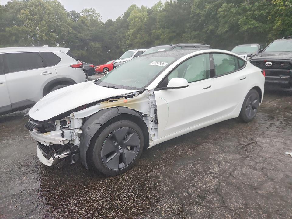 2022 Tesla Model 3 VIN 5YJ3E1EB2NF167029 — COPART salvage auction photo