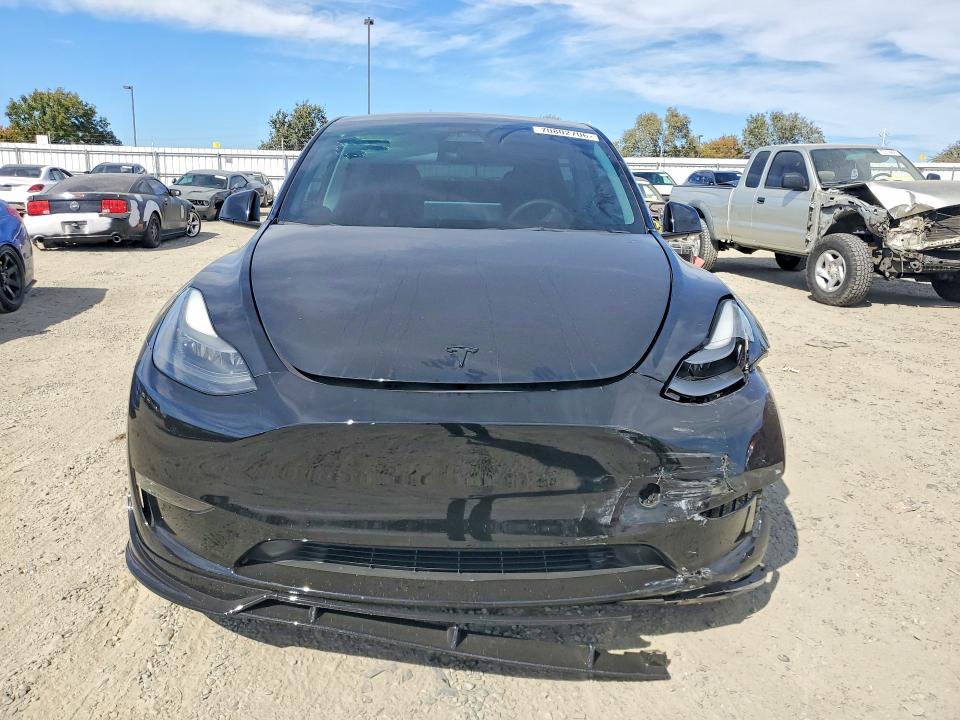 2023 Tesla Model y VIN 7SAYGDEFXPF702988 COPART salvage auction — FRONT END, Salvage Title, sold $15,600 on 2026-10-08 (photo 5)
