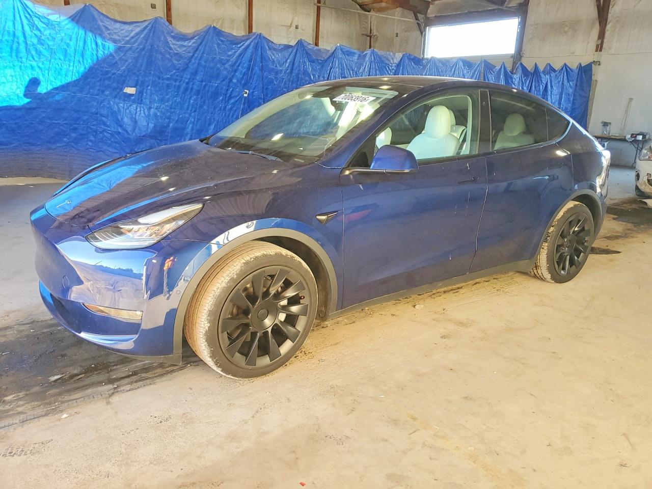 2022 Tesla Model Y VIN 7SAYGAEE9NF486456 COPART salvage auction — Normal Wear, KY - CERT OF TITLE-REBUILT VEHICLE, sold $9,000 on 2026-10-08 (photo 1)