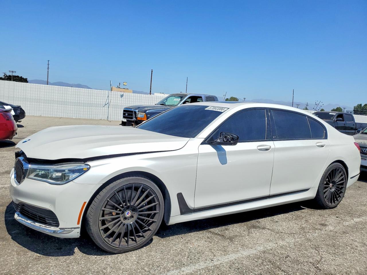 2019 BMW 7er VIN WBA7F2C15KB242428 — COPART salvage auction photo