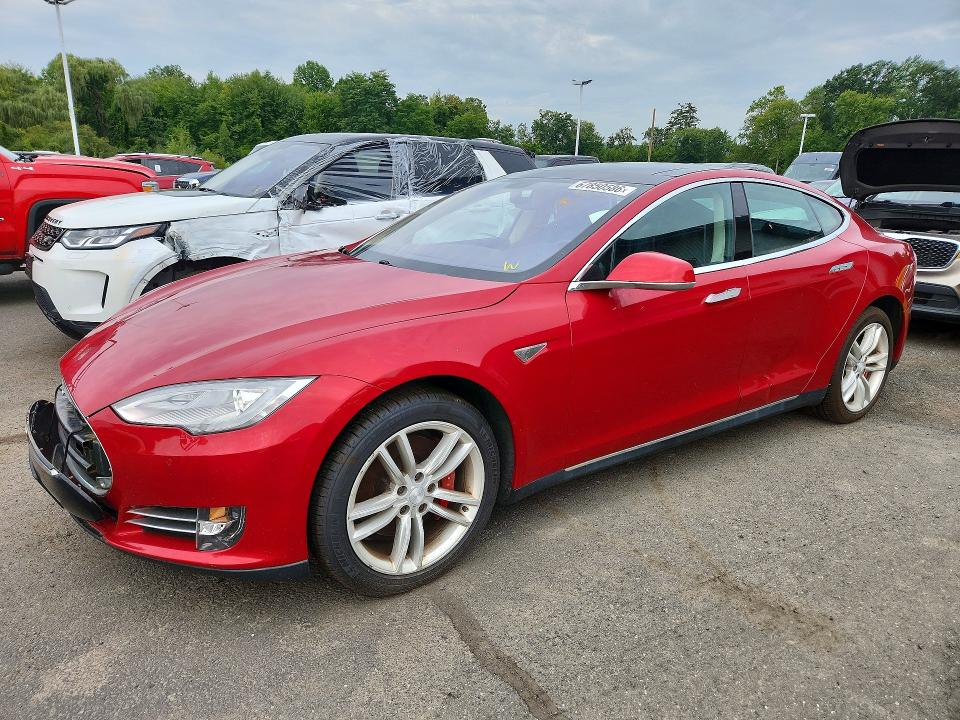 2014 Tesla Model s VIN 5YJSA1H17EFP31803 — COPART salvage auction photo