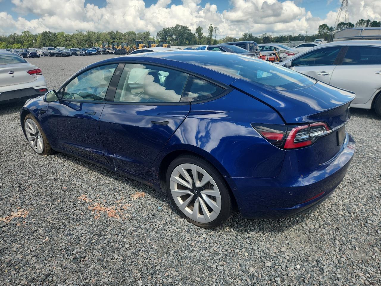 2022 Tesla Model 3 VIN 5YJ3E1EA8NF369512 COPART salvage auction — Rear End, FL - CERTIFICATE OF TITLE, sold $20,175 on 2026-09-17 (photo 2)