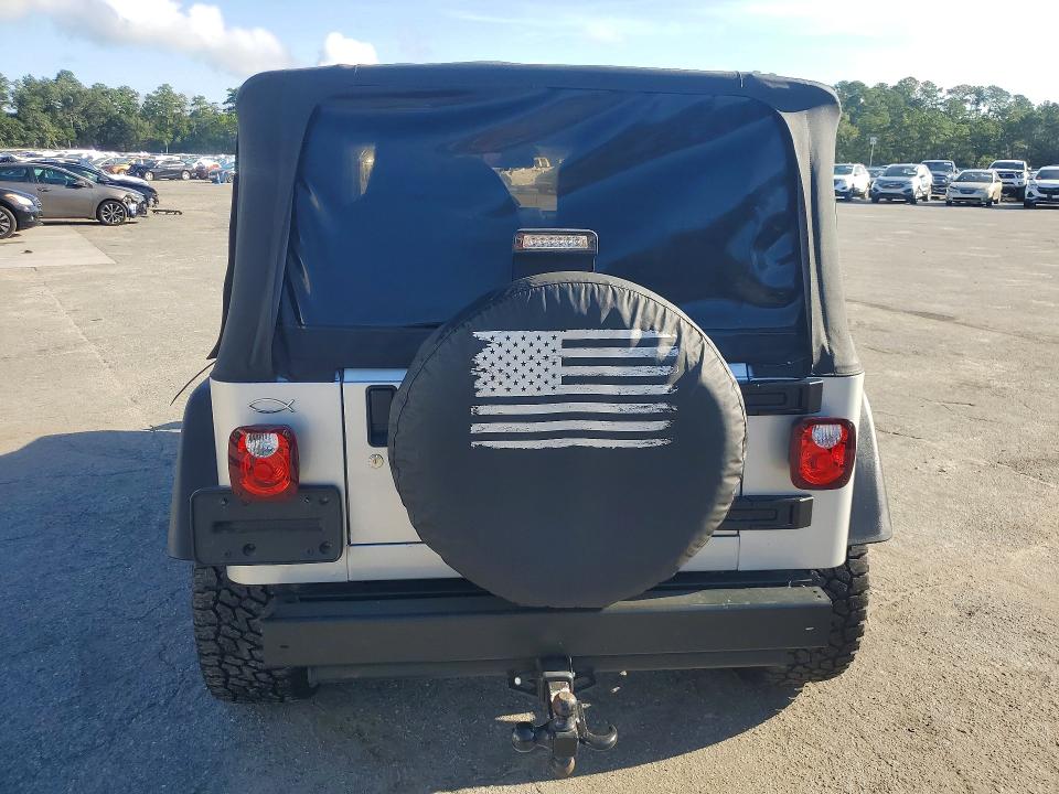2004 Jeep Wrangler / VIN 1J4FA39S24P797436 COPART salvage auction — MECHANICAL, GA - CERTIFICATE OF TITLE, sold $2,528 on 2026-09-07 (photo 6)