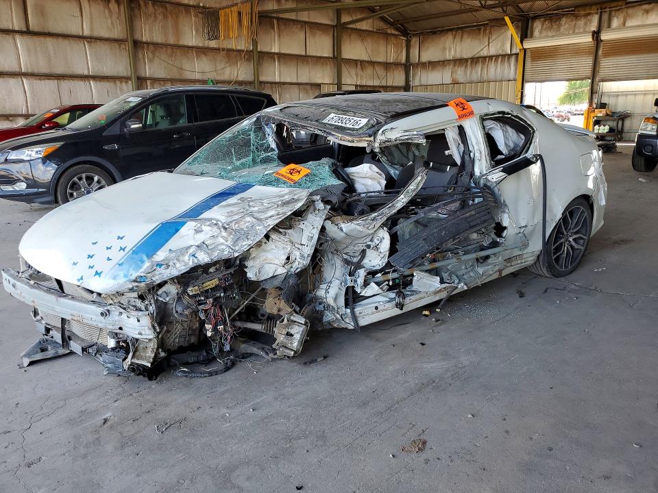 2015 Scion Tc VIN JTKJF5C72FJ004880 COPART salvage auction — ALL OVER, AZ - CERT OF TITLE - SALVAGE, sold $225 on 2026-09-23 (photo 1)