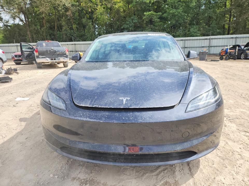 2025 Tesla Model 3 VIN 5YJ3E1EA4SF890917 COPART salvage auction — MINOR DENT/SCRATCHES, FL, sold $18,600 on 2026-10-23 (photo 5)