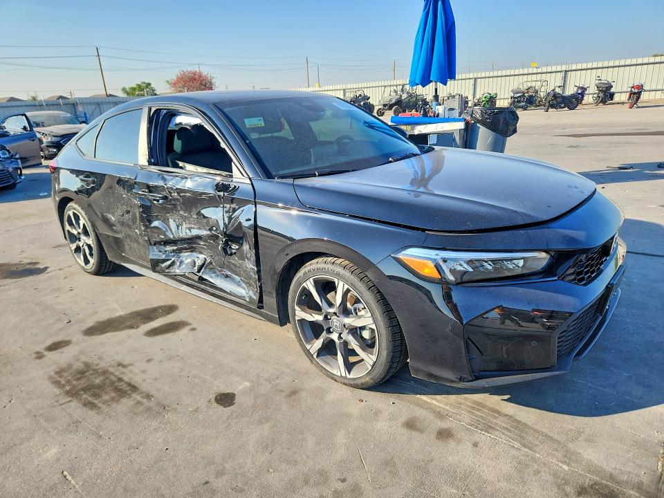 2026 Honda Civic VIN 19XFL4H97TE009348 COPART salvage auction — SIDE, Salvage Title, sold $7,100 on 2026-10-16 (photo 4)