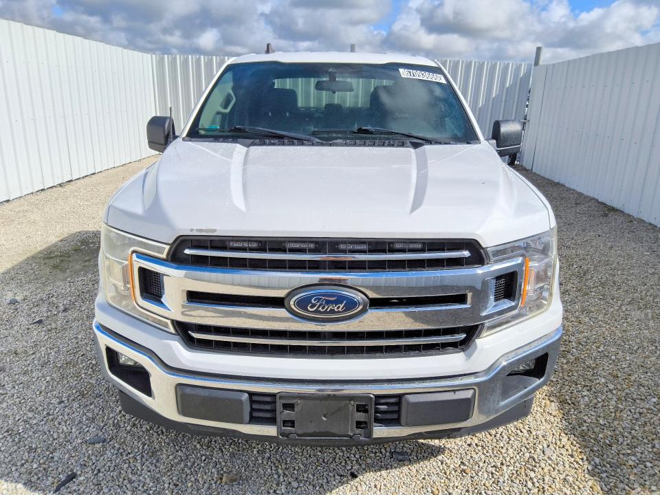 2019 Ford F-150 lightning VIN 1FTEW1CB3KFA73130 COPART salvage auction — MINOR DENT/SCRATCHES, FL - CERTIFICATE OF TITLE, sold $9,400 on 2026-09-08 (photo 5)