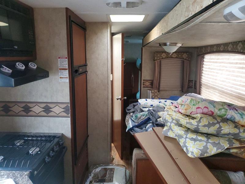 2015 Other Passport VIN 4YDT29222FT410099 COPART salvage auction — REAR END, MI - CERTIFICATE OF TITLE, sold $1,850 on 2026-10-13 (photo 6)