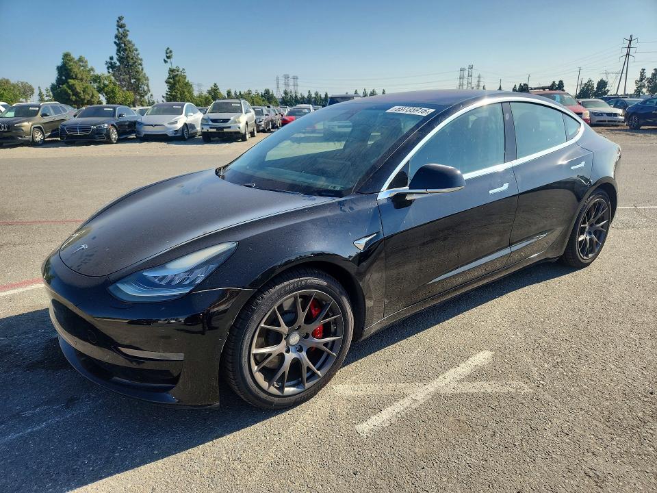 2018 Tesla Model 3 VIN 5YJ3E1EB7JF083833 — COPART salvage auction photo