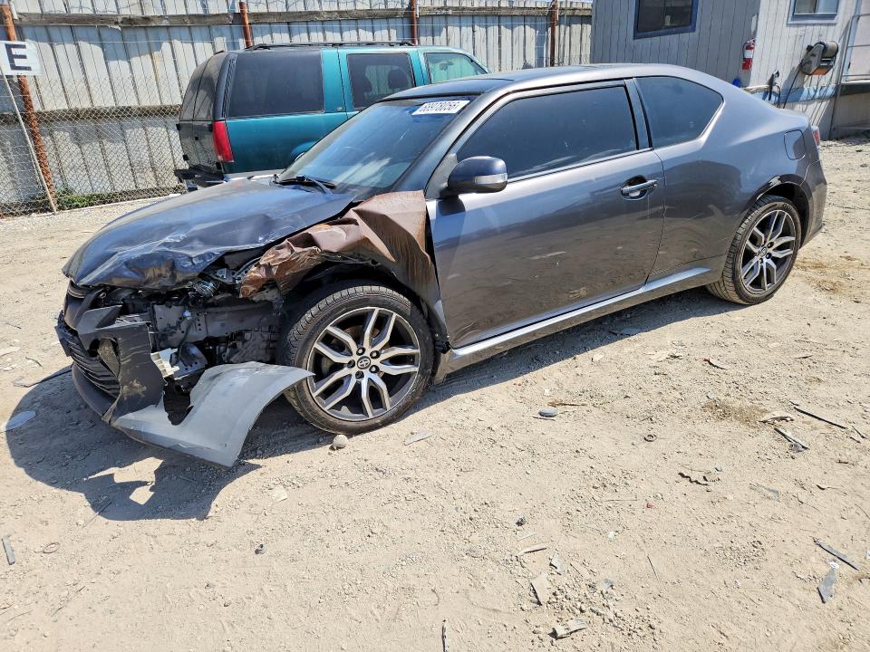 2015 Scion Tc VIN JTKJF5C71FJ013330 COPART salvage auction — FRONT END, Ca - Dis/Dlr/Exp Only Clean Title, sold $700 on 2026-09-28 (photo 1)
