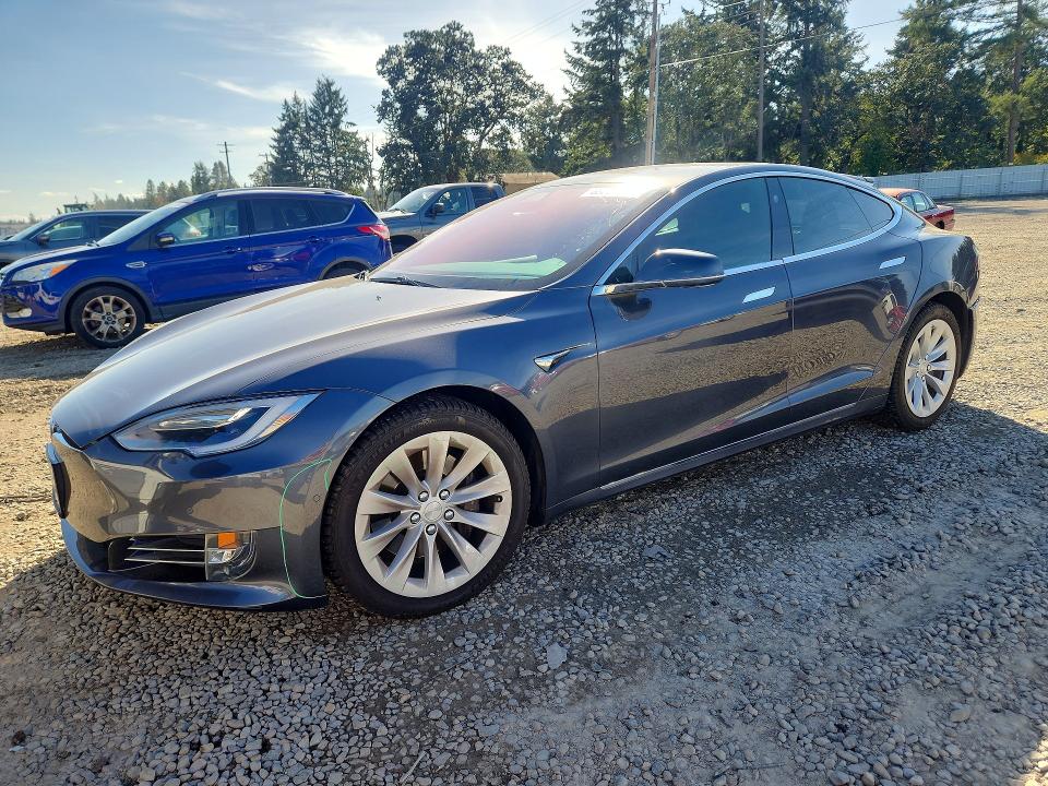 2017 Tesla Model s VIN 5YJSA1E22HF217407 — COPART salvage auction photo
