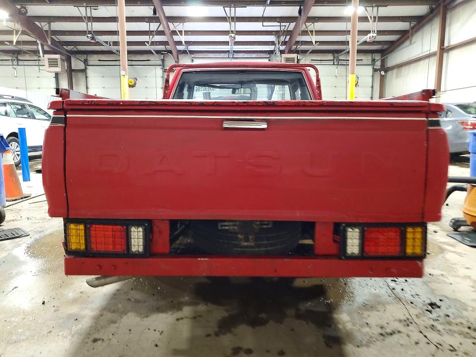 1981 Datsun 720 VIN JN6MD06S6BW022404 COPART salvage auction — SIDE, Pa - Cert Of Salv-R=Reconstructed, sold $750 on 2026-09-29 (photo 6)