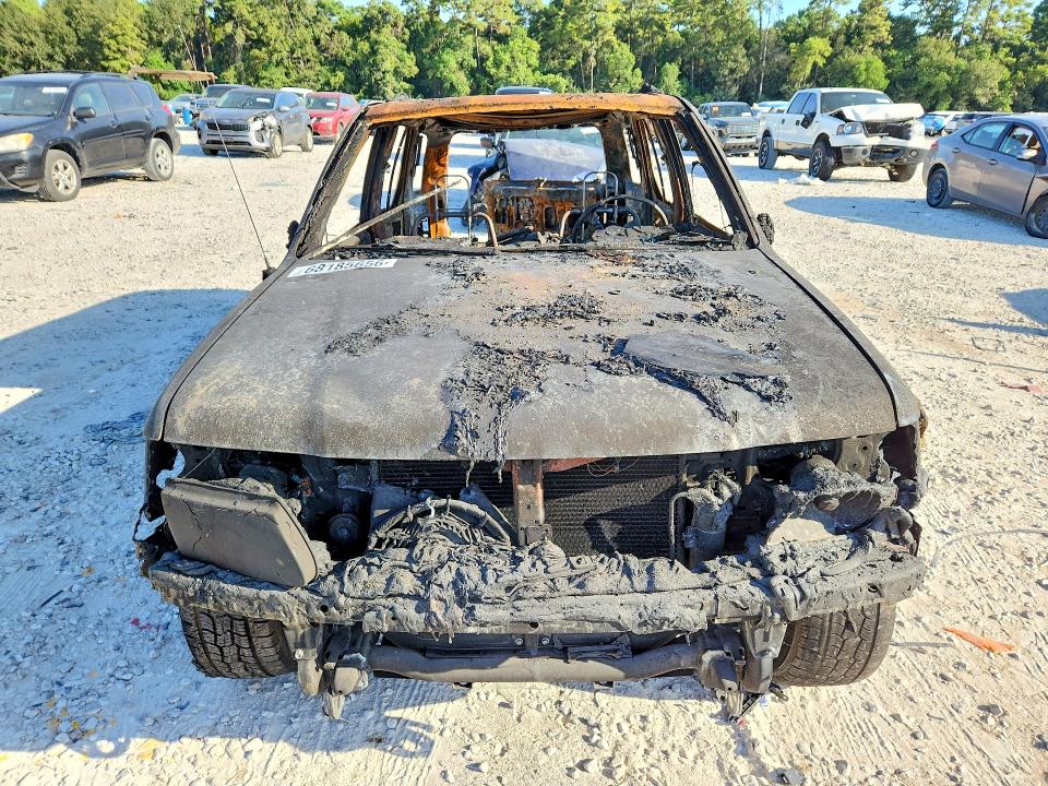 2000 Isuzu Rodeo VIN 4S2CK58W2Y4315145 COPART salvage auction — BURN, TX - NONREPAIRABLE TITLE, sold $175 on 2026-10-02 (photo 5)