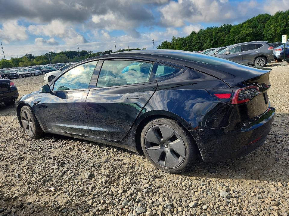 2021 Tesla Model 3 VIN 5YJ3E1EA0MF028426 COPART salvage auction — MINOR DENT/SCRATCHES, Ma - Certificate Of Title (P), sold $10,700 on 2026-10-07 (photo 2)