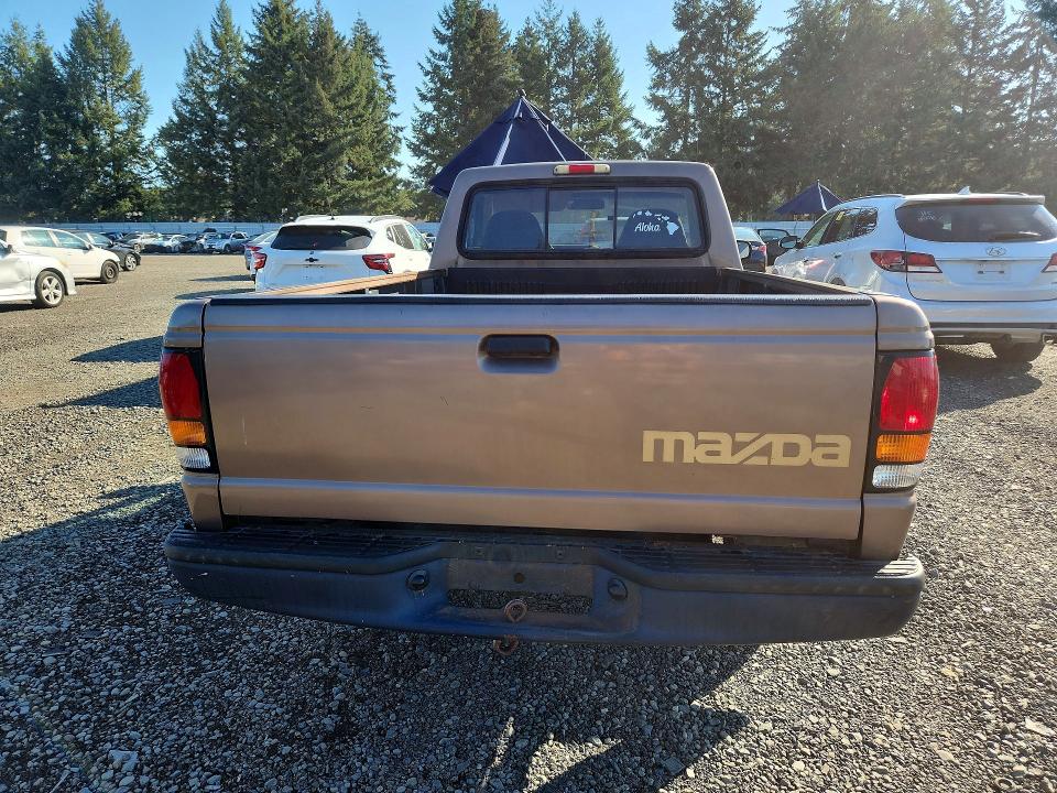 1994 Mazda B4000 VIN 4F4CR12X4RTM16817 COPART salvage auction — MINOR DENT/SCRATCHES, WA - VEHICLE CERT OF OWNERSHIP-TITL, sold $2,850 on 2026-10-02 (photo 6)