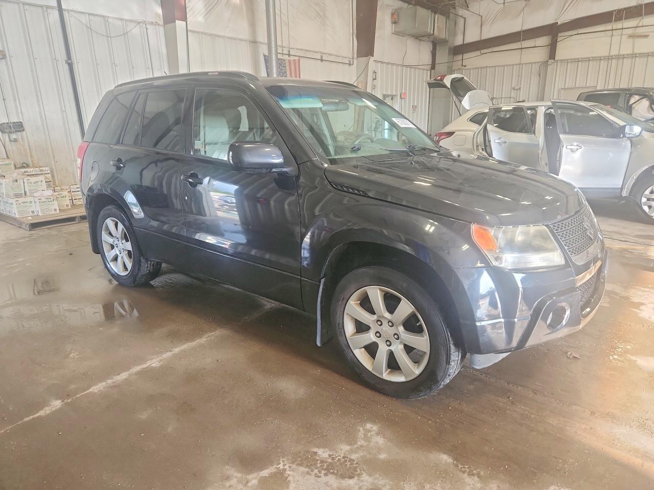2012 Suzuki Grand Vitara VIN JS3TD0D76C4101373 COPART salvage auction — Front End, WI - CERTIFICATE OF TITLE, sold $1,200 on 2026-09-19 (photo 4)