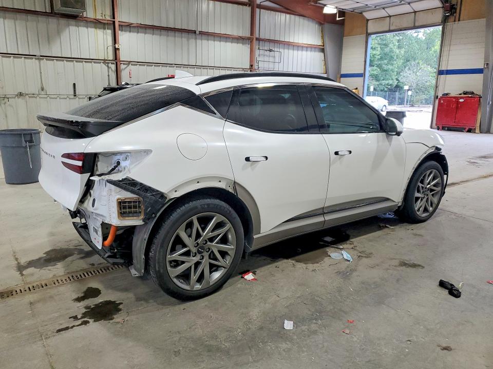 2023 Genesis GV60 VIN KMUKCDTC7PU014412 COPART salvage auction — REAR END, VA - CERTIFICATE OF TITLE, sold $225 on 2026-10-02 (photo 3)