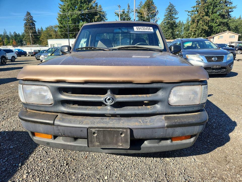 1994 Mazda B4000 VIN 4F4CR12X4RTM16817 COPART salvage auction — MINOR DENT/SCRATCHES, Wa - Vehicle Cert Of Ownership-Titl, sold $2,100 on 2026-09-22 (photo 5)