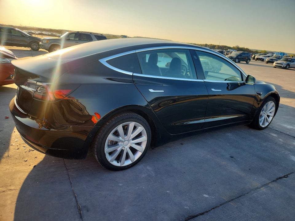 2019 Tesla Model 3 VIN 5YJ3E1EA8KF406375 COPART salvage auction — NORMAL WEAR, TX - CERT OF TITLE-REBUILT SALVAGE (P), sold $6,100 on 2026-09-29 (photo 3)