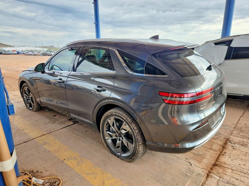 2023 Genesis Gv70 VIN 5NMMCET14PH001074 COPART salvage auction — SIDE, Az - Cert Of Title - Salvage, sold $17,200 on 2026-09-15 (photo 2)