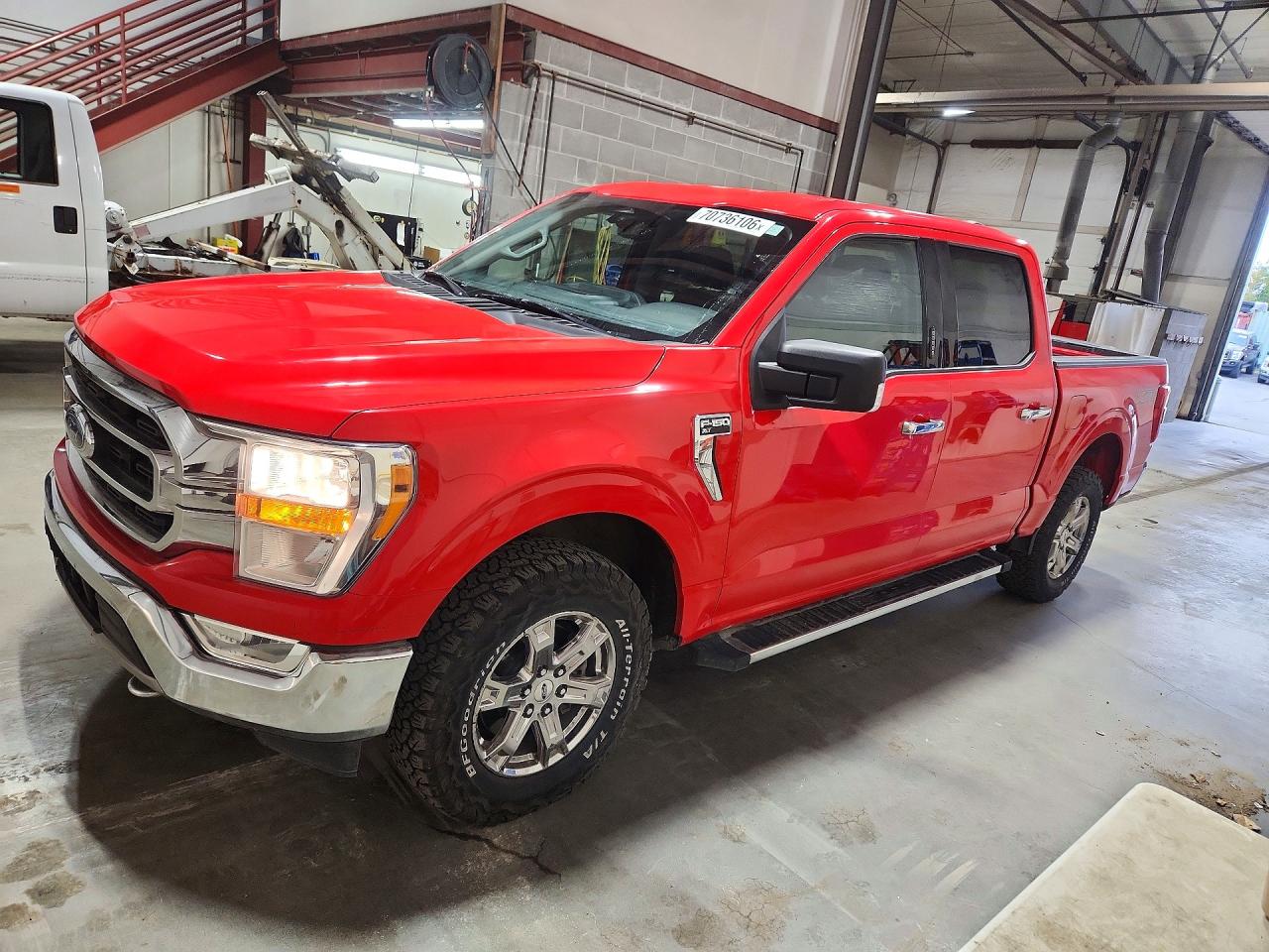 2021 Ford F-150 Lightning VIN 1FTEW1EP0MKD27704 — COPART salvage auction photo