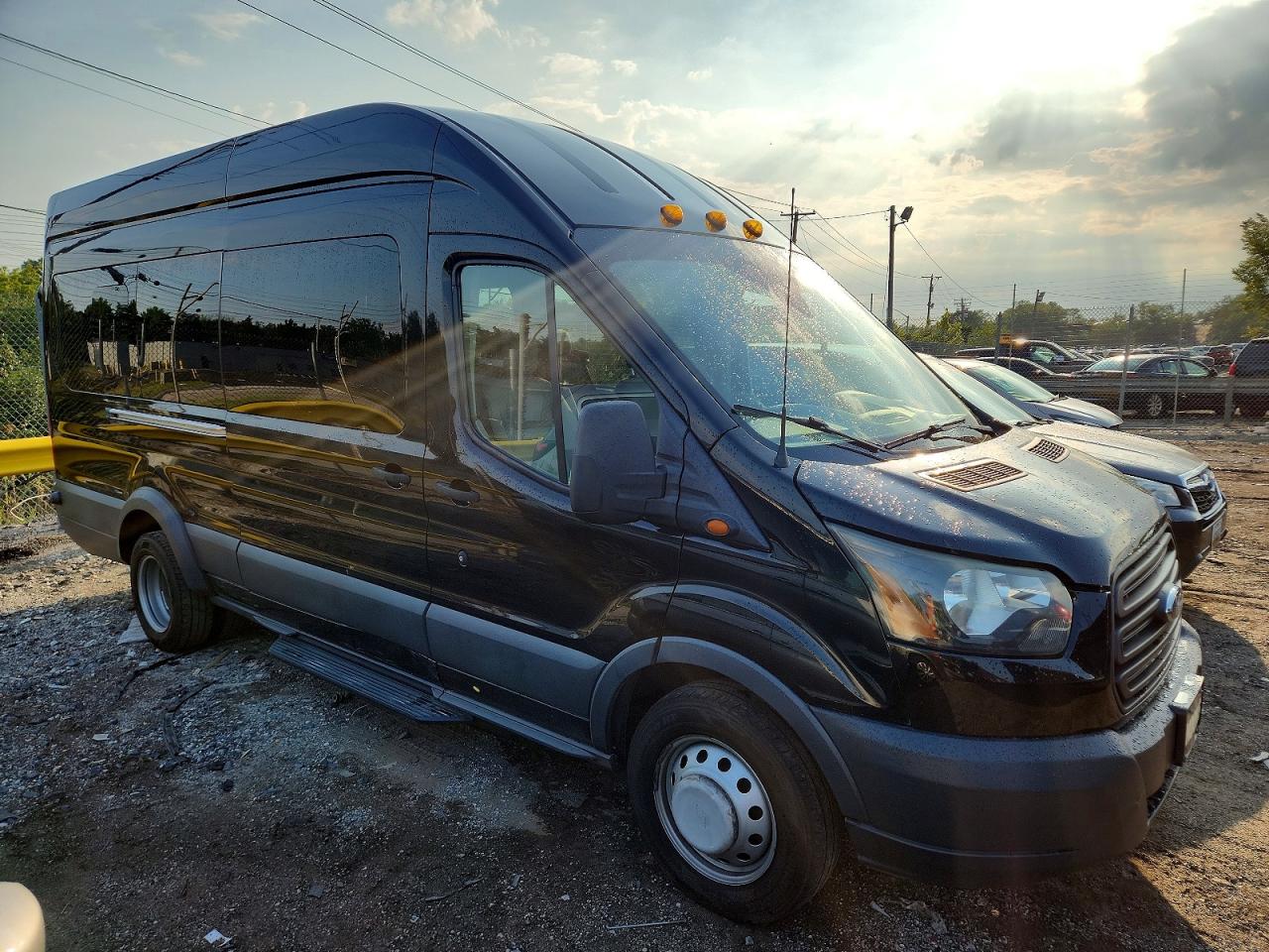 2016 Ford Transit VIN 1FBVU4XG8GKA52323 — COPART salvage auction photo