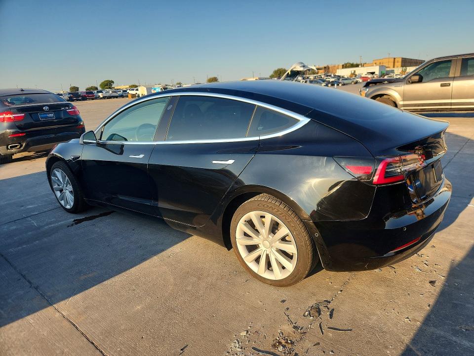 2019 Tesla Model 3 VIN 5YJ3E1EA8KF406375 COPART salvage auction — NORMAL WEAR, TX - CERT OF TITLE-REBUILT SALVAGE (P), sold $6,100 on 2026-09-29 (photo 2)