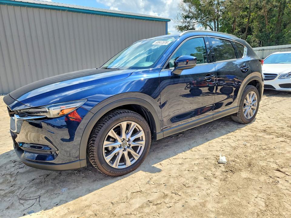 2019 Mazda Cx-5 VIN JM3KFADM7K1602957 — COPART salvage auction photo