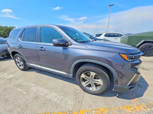 2023 Honda Pilot VIN 5FNYG1H57PB023517 — COPART salvage auction photo