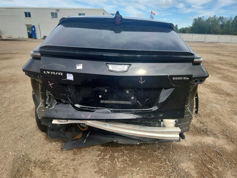 2024 Cadillac Lyriq VIN 1GYKPMRL2RZ137226 COPART salvage auction — REAR END, On - Permit No Brand - Unfit, sold $21,450 on 2026-09-22 (photo 6)