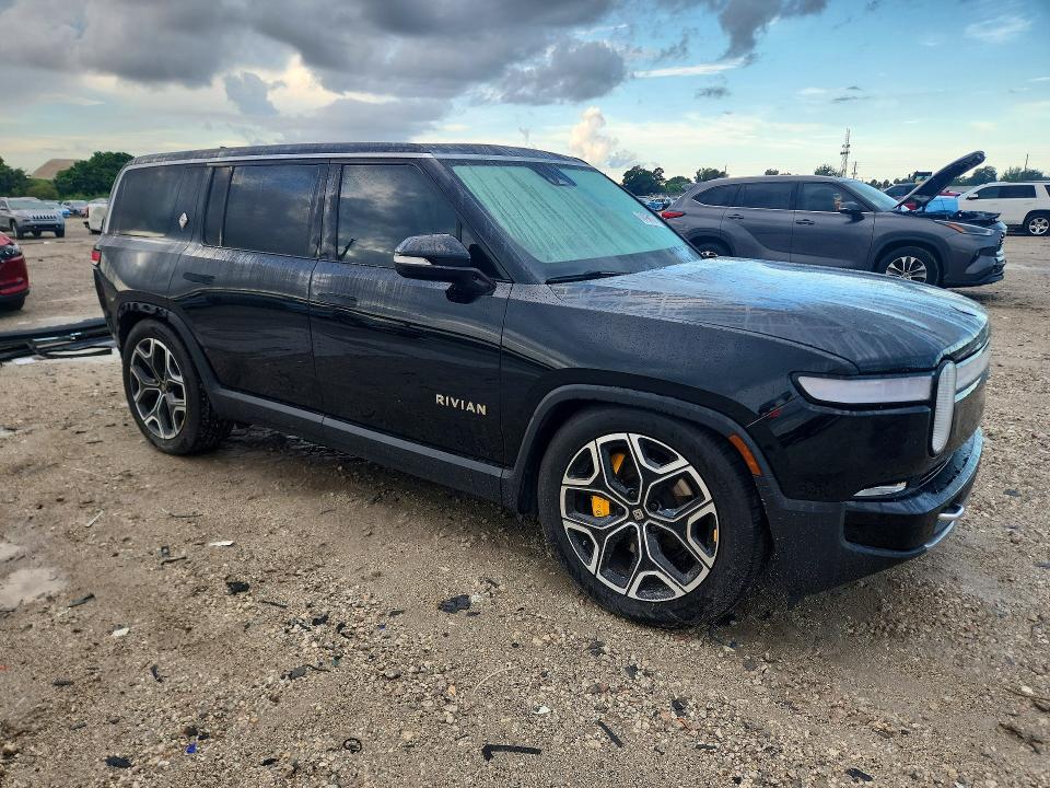 2023 Rivian R1s VIN 7PDSGABA7PN003807 COPART salvage auction — REAR END, FL - CERT OF TITLE SLVG REBUILDABLE, sold $22,600 on 2026-09-22 (photo 4)
