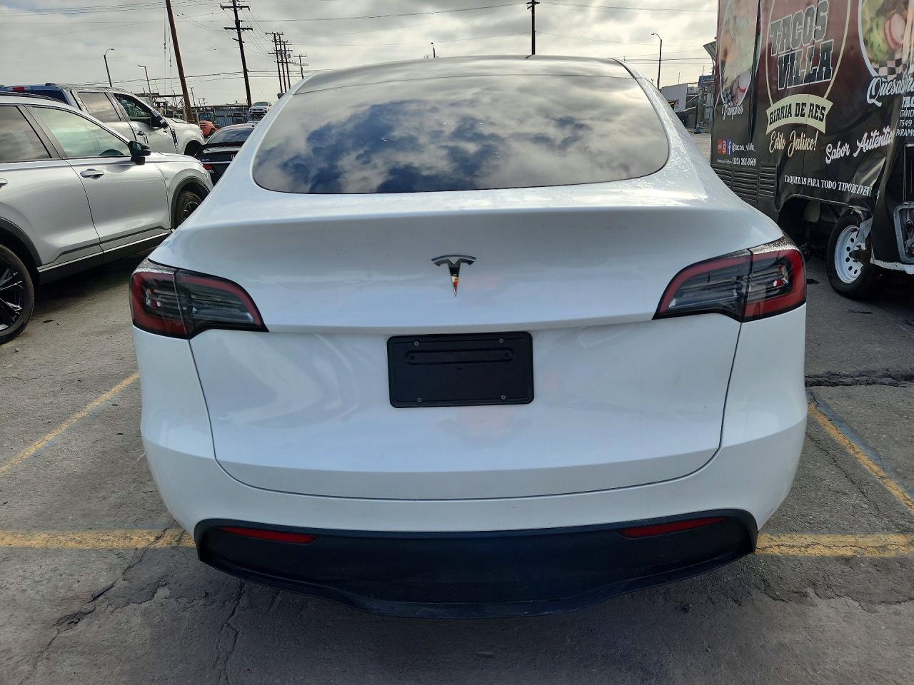 2024 Tesla Model Y VIN 7SAYGDED2RF035707 COPART salvage auction — Front End, CA - SALVAGE CERTIFICATE, sold $16,400 on 2026-10-01 (photo 6)