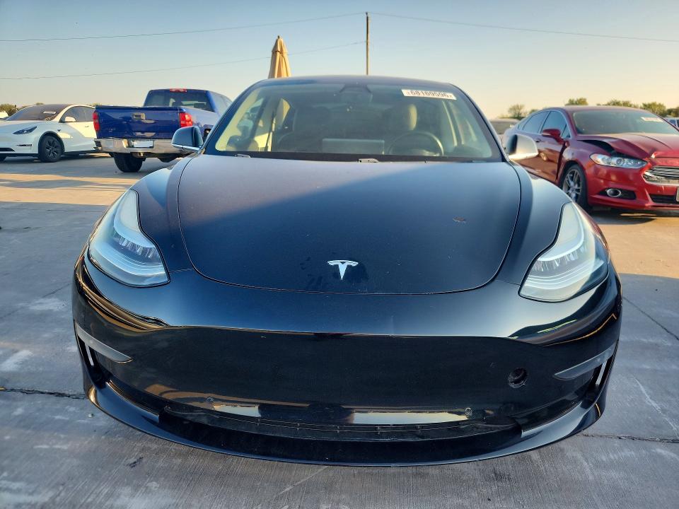 2019 Tesla Model 3 VIN 5YJ3E1EA8KF406375 COPART salvage auction — NORMAL WEAR, TX - CERT OF TITLE-REBUILT SALVAGE (P), sold $3,950 on 2026-09-17 (photo 5)