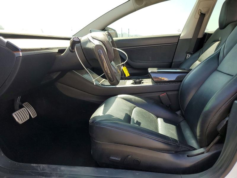 2020 Tesla Model 3 VIN 5YJ3E1EC1LF714233 COPART salvage auction — MINOR DENT/SCRATCHES, Ca - Dis/Dlr/Exp Only Clean Title (P), sold $7,800 on 2026-10-06 (photo 7)