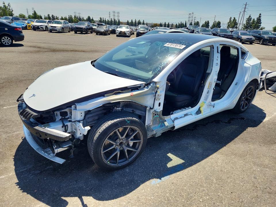 2023 Tesla Model 3 VIN 5YJ3E1EA7PF516339 COPART salvage auction — SIDE, Salvage Title, sold $7,800 on 2026-10-08 (photo 1)
