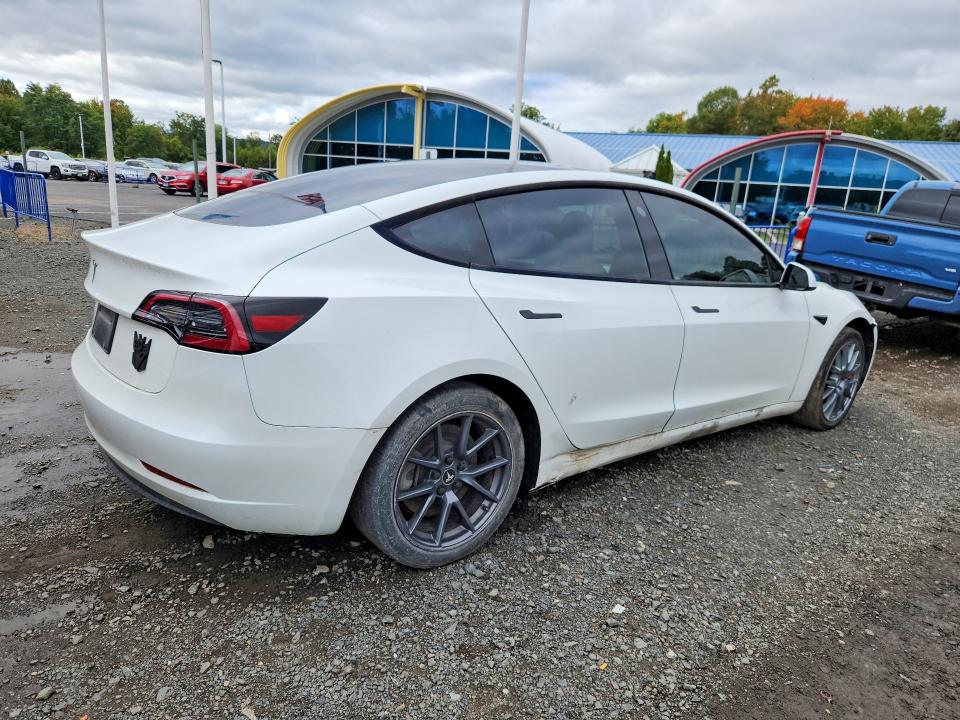 2023 Tesla Model 3 VIN 5YJ3E1EAXPF504847 COPART salvage auction — FRONT END, Salvage Title, sold $15,900 on 2026-10-08 (photo 3)