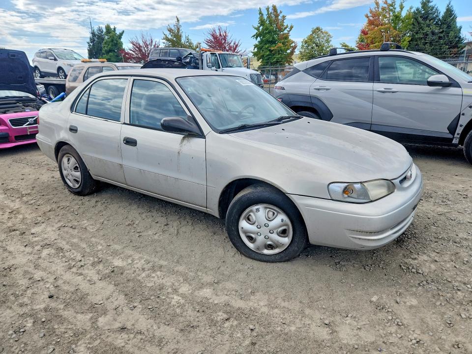2000 Toyt Corolla VIN 1NXBR12E9YZ365600 COPART salvage auction — MINOR DENT/SCRATCHES, OR - CERTIFICATE OF TITLE, sold $175 on 2026-09-29 (photo 4)