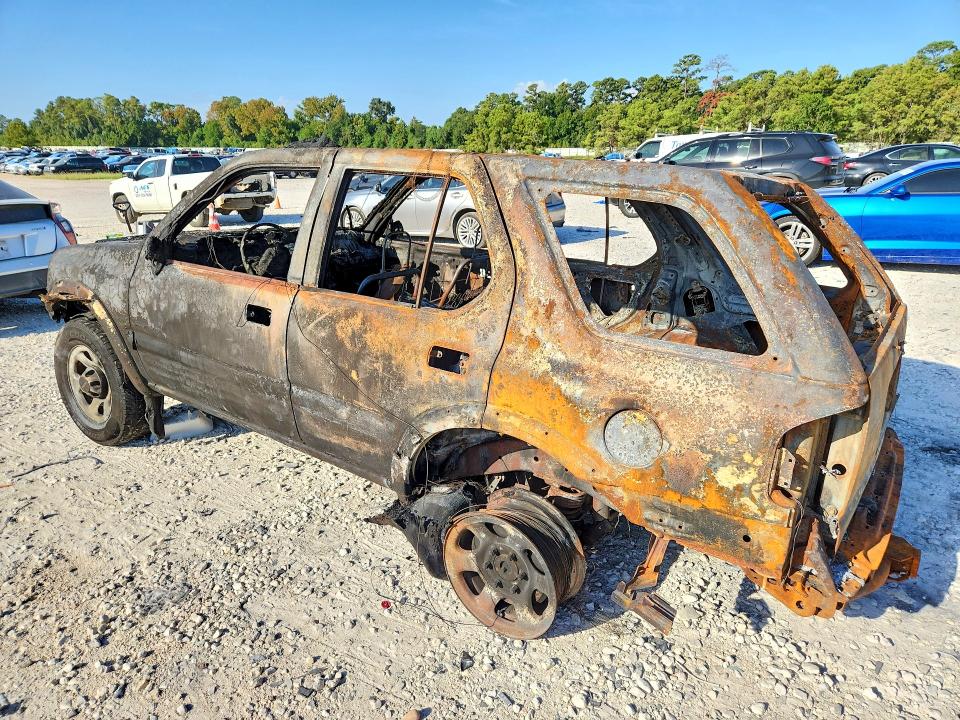 2000 Isuzu Rodeo VIN 4S2CK58W2Y4315145 COPART salvage auction — BURN, TX - NONREPAIRABLE TITLE, sold $175 on 2026-10-02 (photo 2)