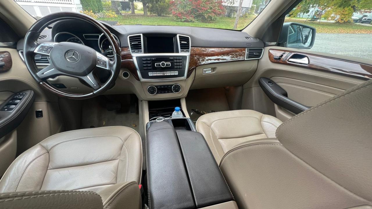 2014 Mercedes-Benz ML-Class VIN 4JGDA7DBXEA299058 COPART salvage auction — NORMAL WEAR, MA - CERTIFICATE OF TITLE (P), sold $6,400 on 2024-10-23 (photo 9)