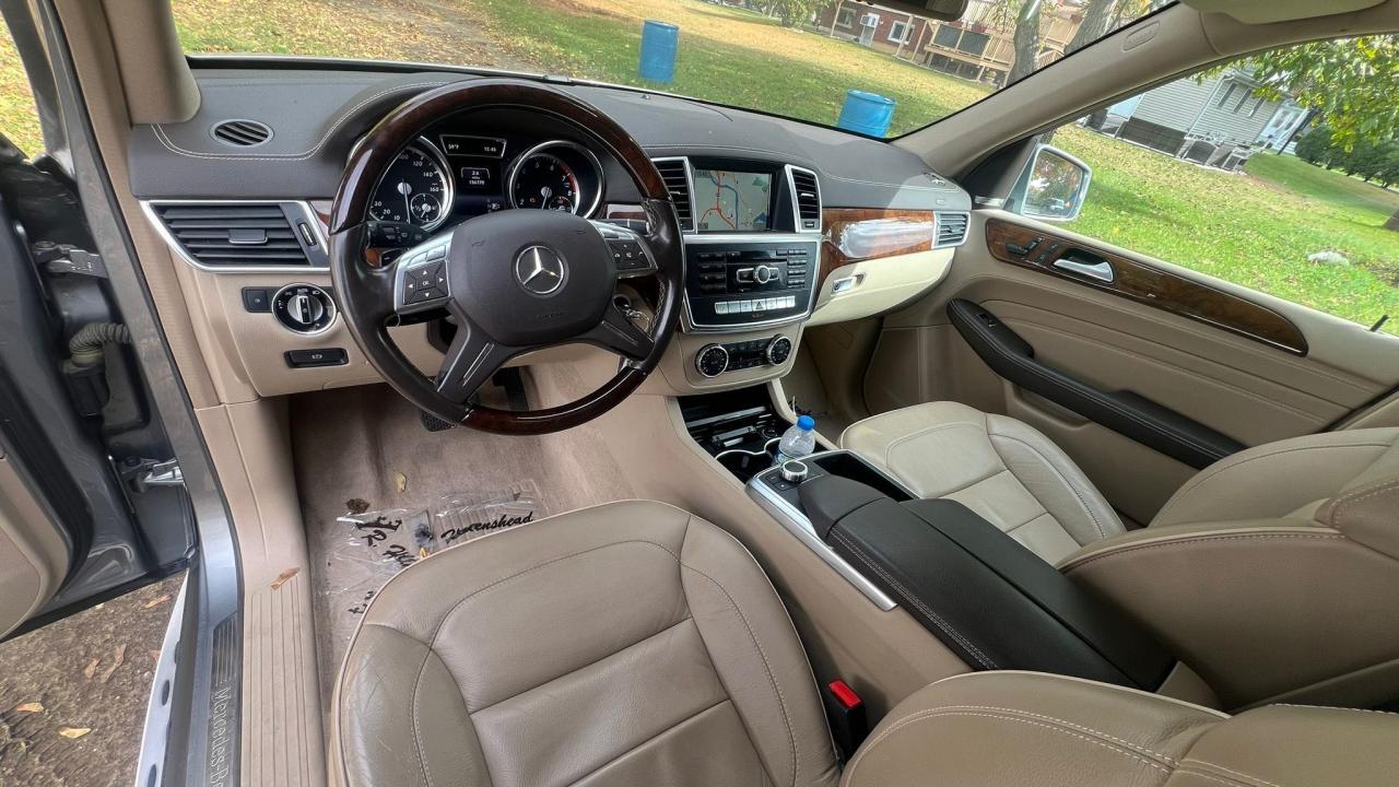 2014 Mercedes-Benz ML-Class VIN 4JGDA7DBXEA299058 COPART salvage auction — NORMAL WEAR, MA - CERTIFICATE OF TITLE (P), sold $6,400 on 2024-10-23 (photo 5)