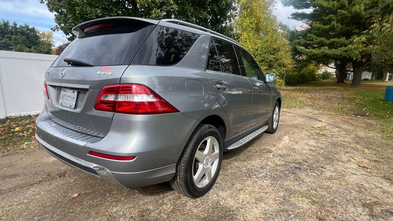 2014 Mercedes-Benz ML-Class VIN 4JGDA7DBXEA299058 COPART salvage auction — NORMAL WEAR, MA - CERTIFICATE OF TITLE (P), sold $6,400 on 2024-10-23 (photo 4)