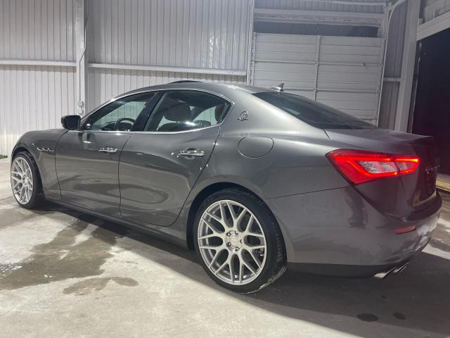 2017 Maserati Ghibli VIN ZAM57XSA9H1206127 COPART salvage auction — Normal Wear, TX - CERT OF TITLE-REBUILT SALVAGE (P), sold $35,000 on 2025-11-24 (photo 4)