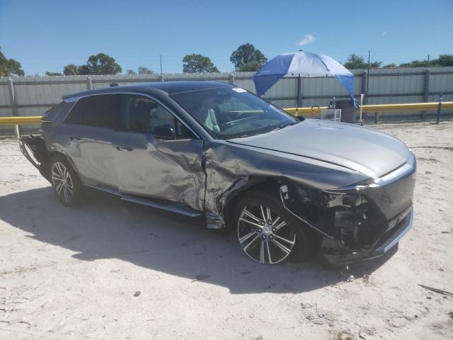 2025 Cadillac Lyriq VIN 1GYKPNRL5SZ310085 COPART salvage auction — SIDE, Fl - Cert Of Title Slvg Rebuildable, sold $3,350 on 2026-07-29 (photo 4)
