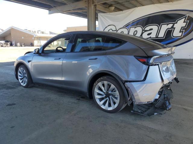 2026 Tesla Model y VIN 7SAYGDEE8TF328964 COPART salvage auction — REAR END, Ca - Salvage Certificate, sold $19,600 on 2026-07-14 (photo 2)