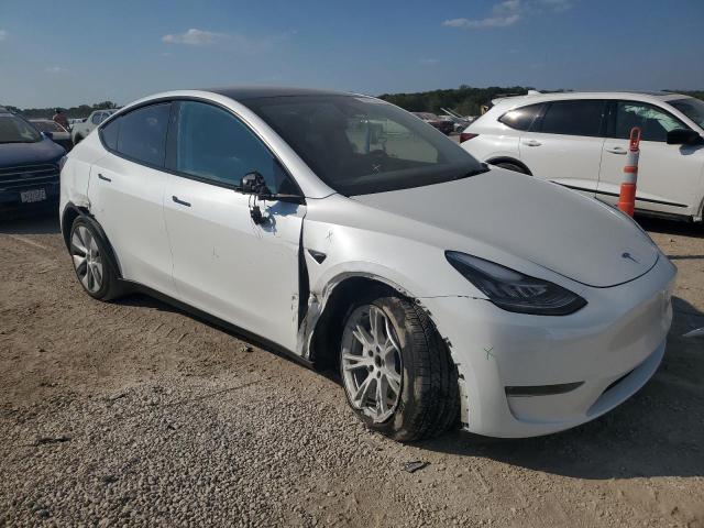 2023 Tesla Model y VIN 7SAYGDEE5PA144262 COPART salvage auction — UNDERCARRIAGE, Mo - Salvage Certificate Of Title, sold $1,300 on 2026-07-28 (photo 4)