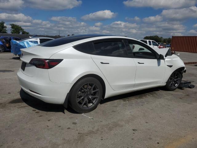2023 Tesla Model 3 VIN 5YJ3E1EAXPF563560 COPART salvage auction — FRONT END, Fl - Cert Of Title Slvg Rebuildable, sold $4,100 on 2026-07-09 (photo 3)