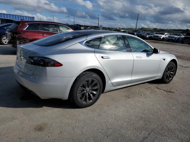 2017 Tesla VIN 5YJSA1E20HF218801 COPART salvage auction — WATER/FLOOD, Fl - Cert Of Title-Slvg Rebld Flood, sold $7,600 on 2026-08-31 (photo 3)