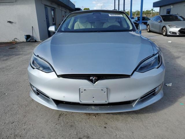 2017 Tesla VIN 5YJSA1E20HF218801 COPART salvage auction — WATER/FLOOD, Fl - Cert Of Title-Slvg Rebld Flood, sold $7,600 on 2026-08-31 (photo 5)