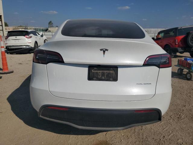 2023 Tesla Model y VIN 7SAYGDEE5PA144262 COPART salvage auction — UNDERCARRIAGE, Mo - Salvage Certificate Of Title, sold $1,300 on 2026-07-28 (photo 6)